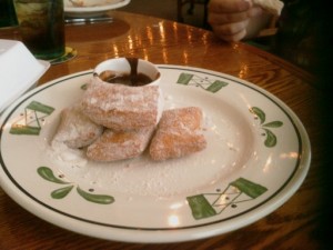 Delicious sugar dough things and chocolate dipping sauce